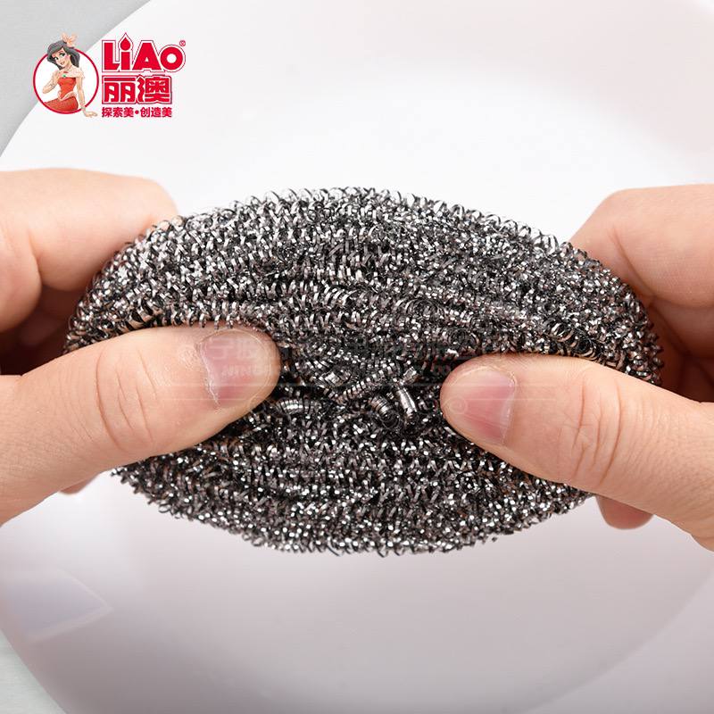 Металлическая губка из нержавеющей стали для эффективной очистки посуды и кухонной утвари. — изображение 2